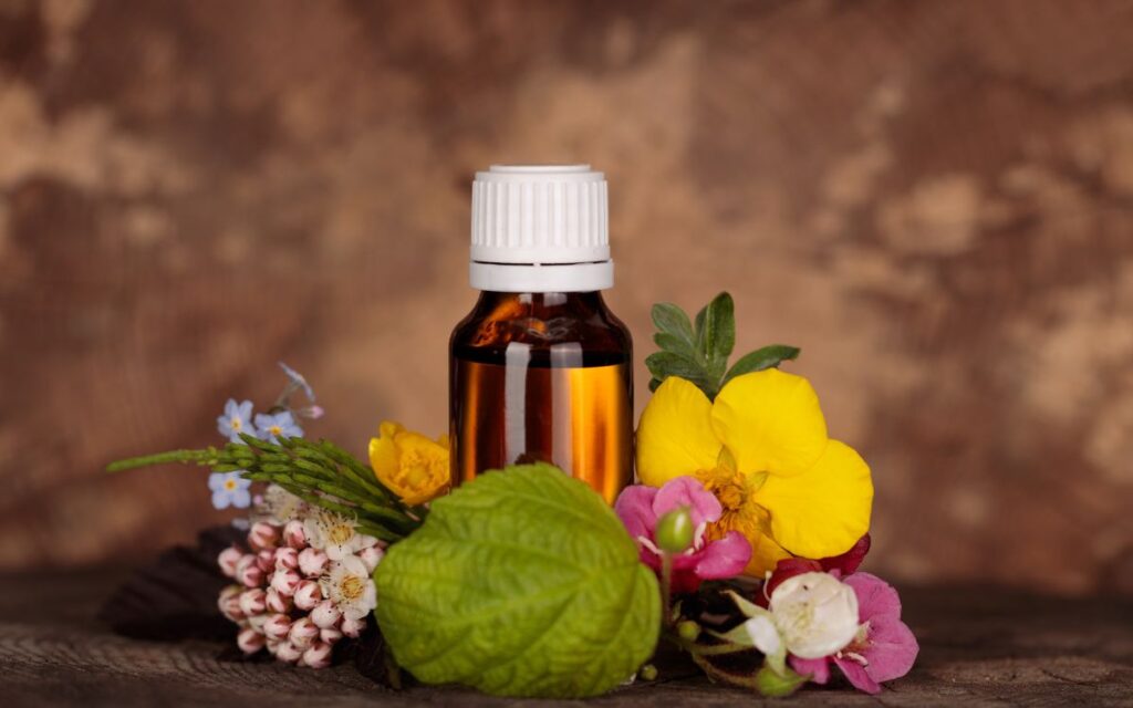Fórmula d'essència floral envoltada de flors naturals decoratives