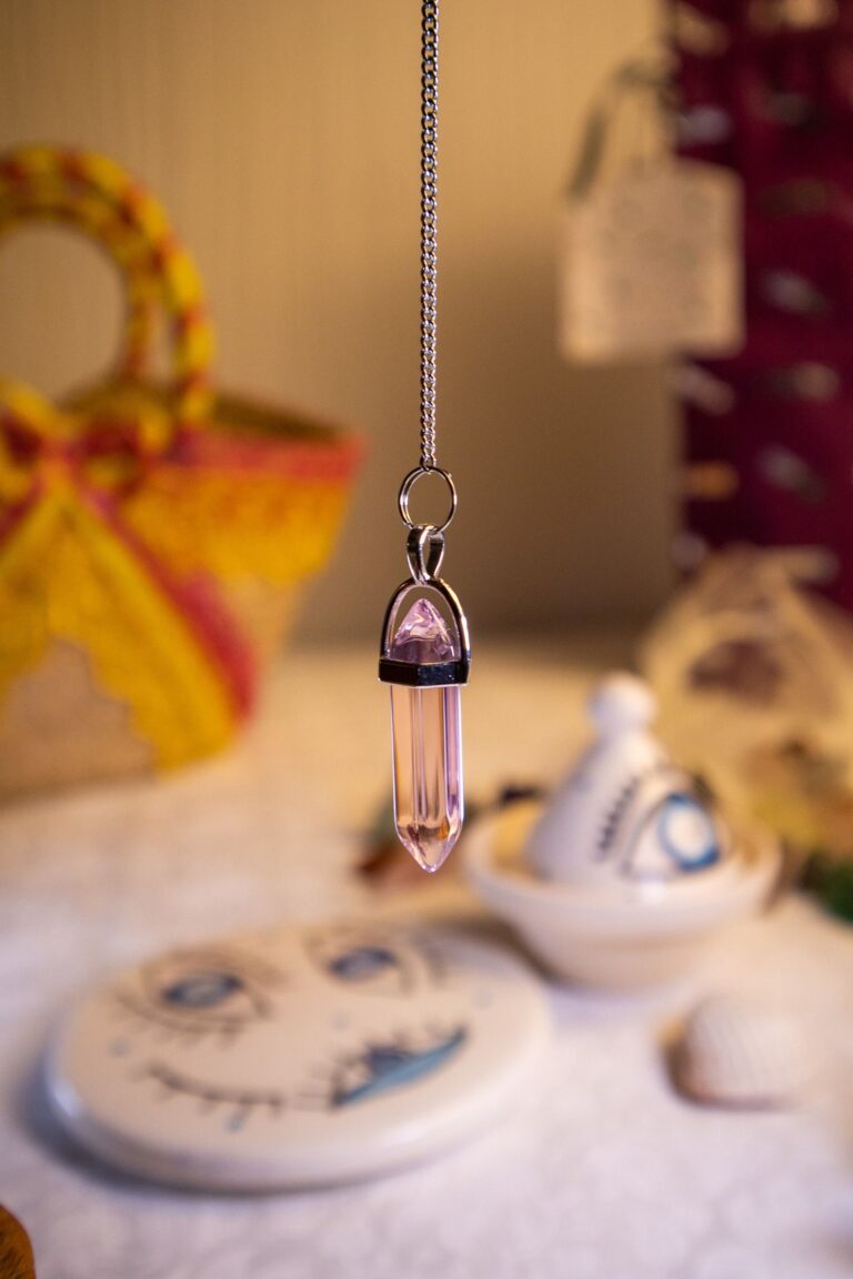 Pendulo esoterico de mineral para terapia energética